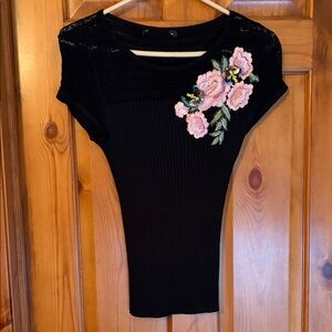 Chic Black Tee with Pink Floral Design